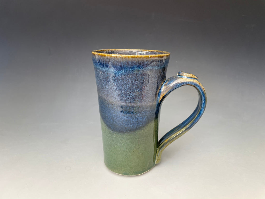 Blue pottery mug. Ceramic tea cup with thumb hold. Gift for Dad. Handmade pottery cup.
