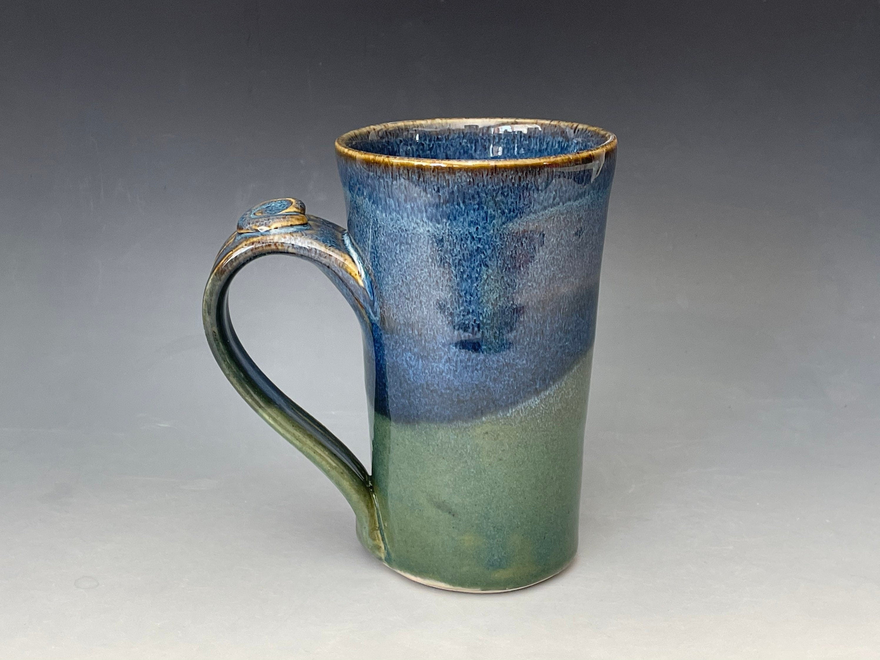 Blue pottery mug. Ceramic tea cup with thumb hold. Gift for Dad. Handmade pottery cup.