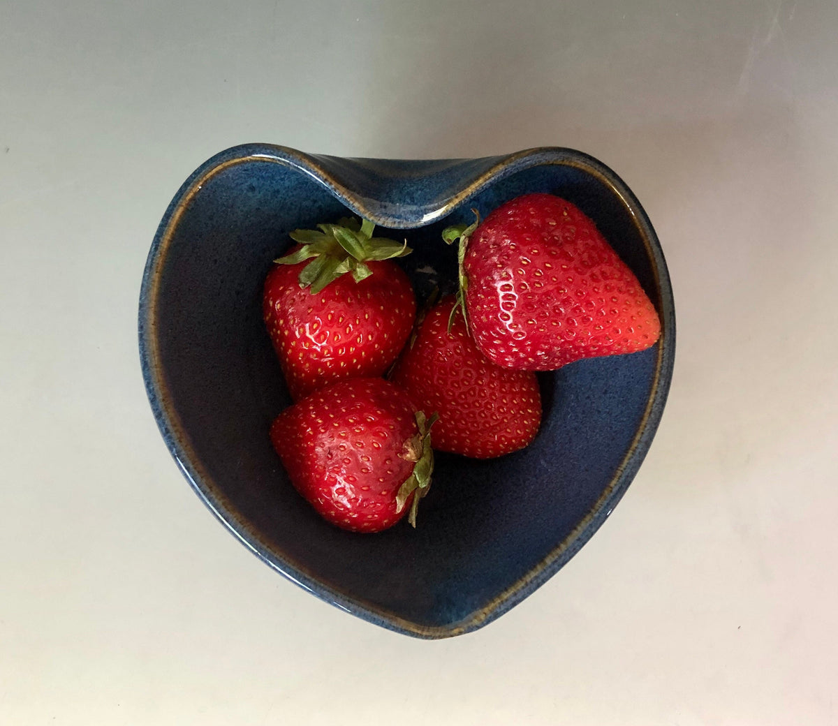 Handmade pottery heart. Blue heart dish.Kitchen prep bowl. 5.25 inches wide by 1.25 inches tall blue bowl.