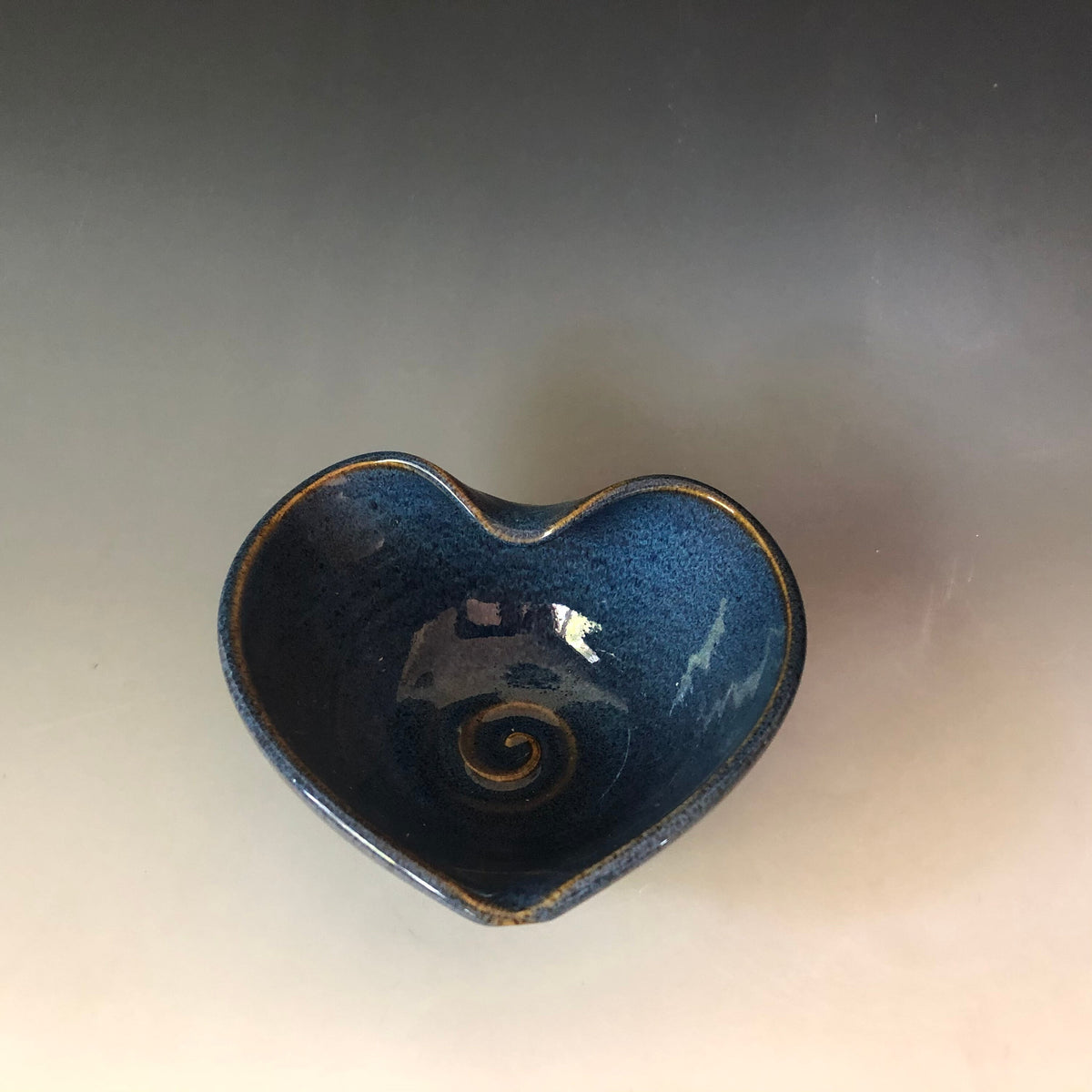Handmade pottery heart. Blue heart dish.Kitchen prep bowl. 5.25 inches wide by 1.25 inches tall blue bowl.