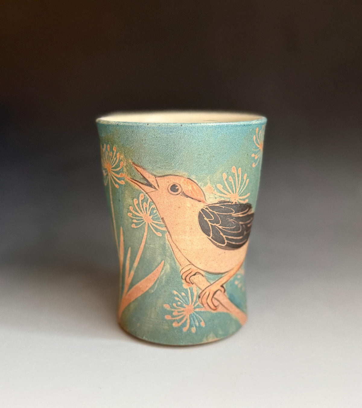Handmade pottery Bird tumbler. 5 inch tall 3inch wide Pottery Vase.  Hand drawn bird water glass with flowers.