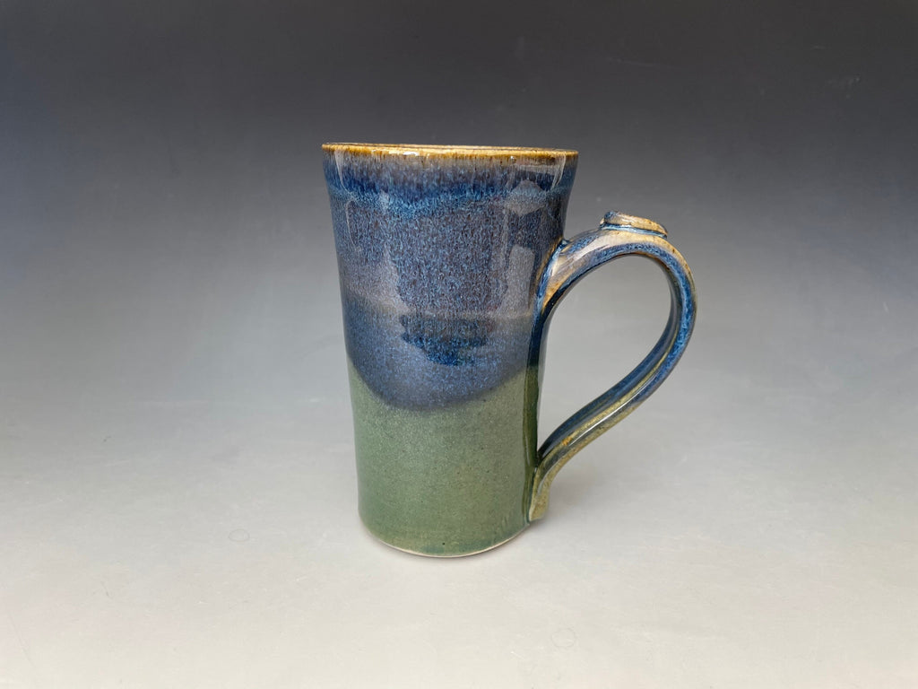 Blue pottery mug. Ceramic tea cup with thumb hold. Gift for Dad. Handmade pottery cup.