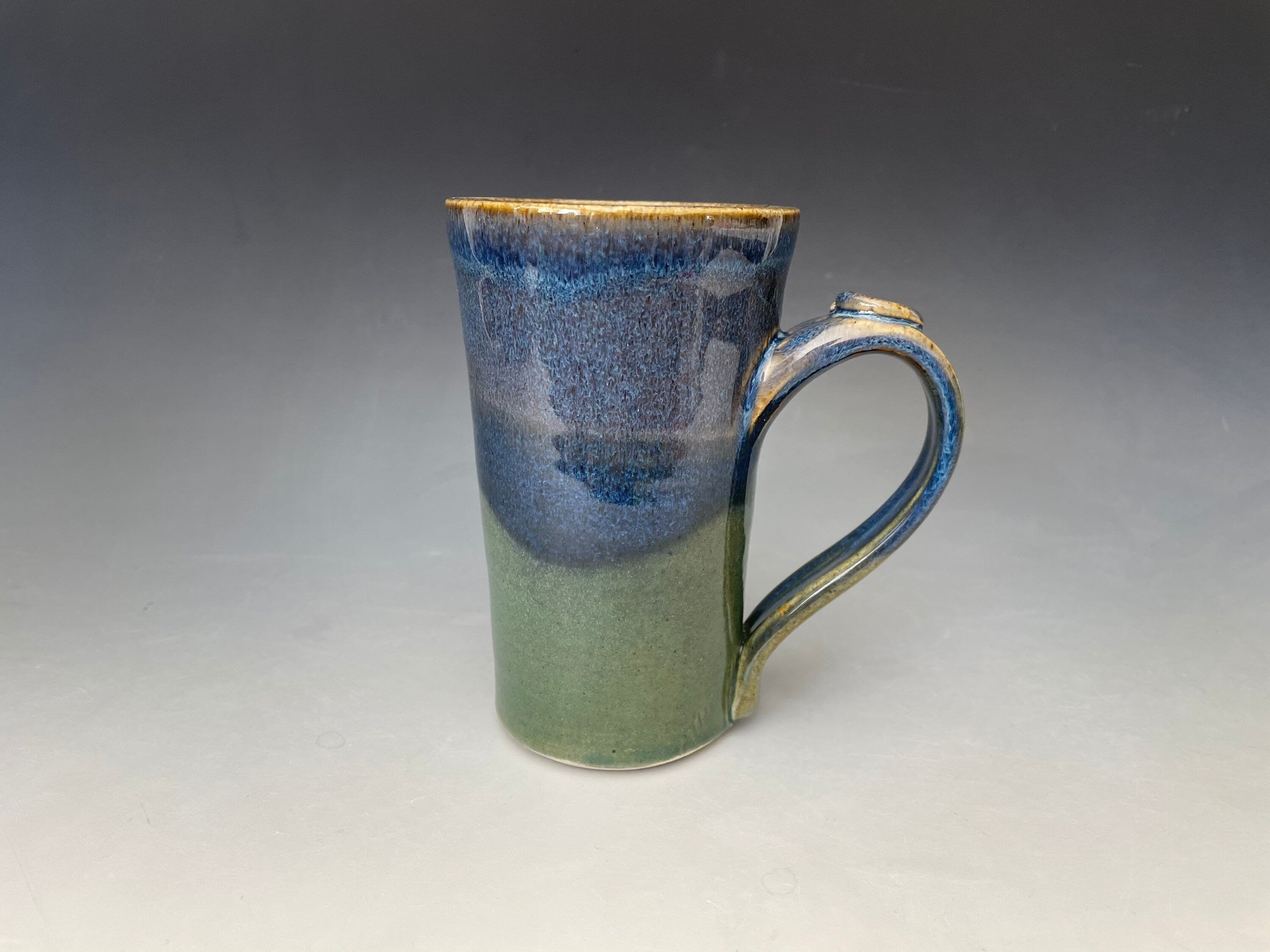 Blue pottery mug. Ceramic tea cup with thumb hold. Gift for Dad. Handmade pottery cup.